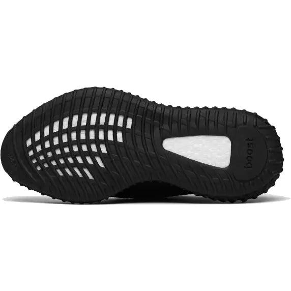 Semelle noire de basket style running avec inserts blancs et relief texturé